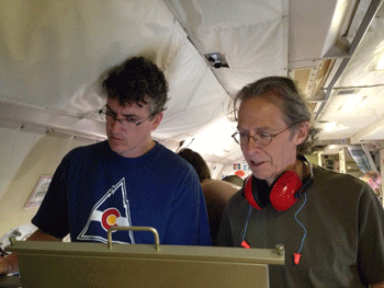 scientists check an instrument pre-flight